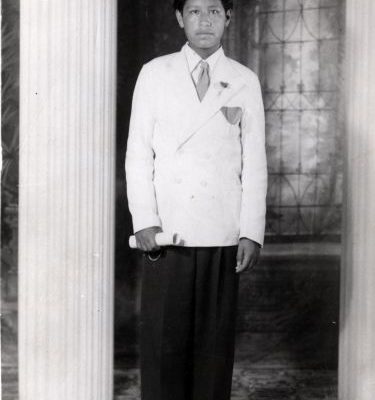 Portrait of Cesar Chavez taken at his 8th grade graduation, 1942. This was his final year of formal schooling before he went to work in the fields full time.